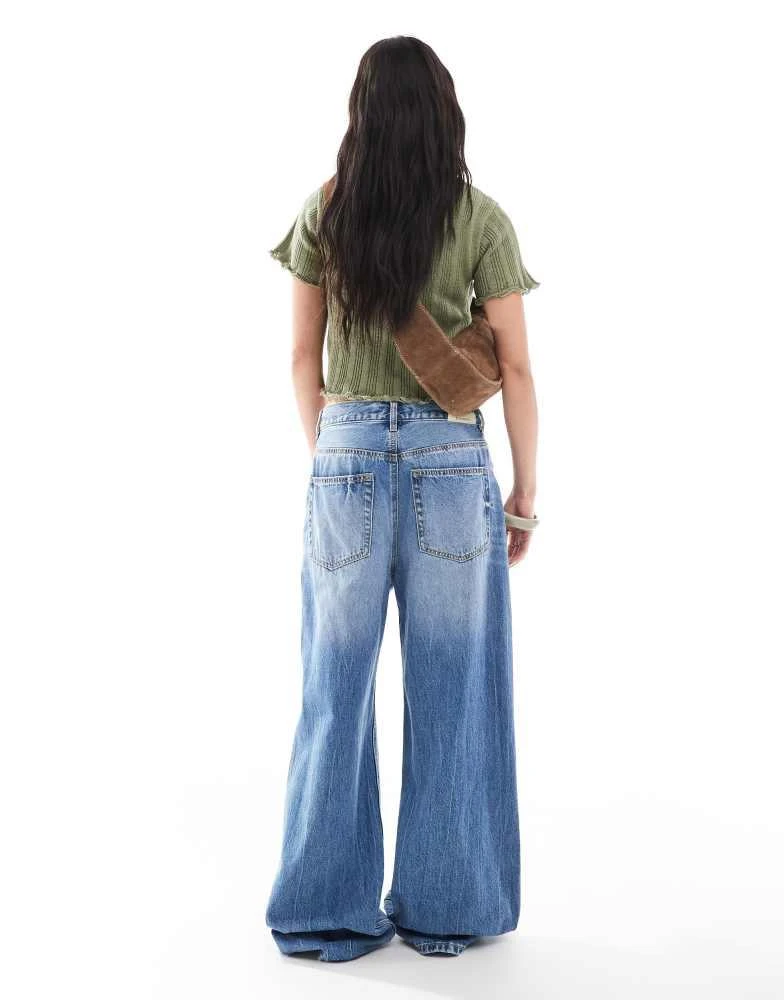 Stradivarius Stradivarius D88 low rise baggy jean in dark wash 2