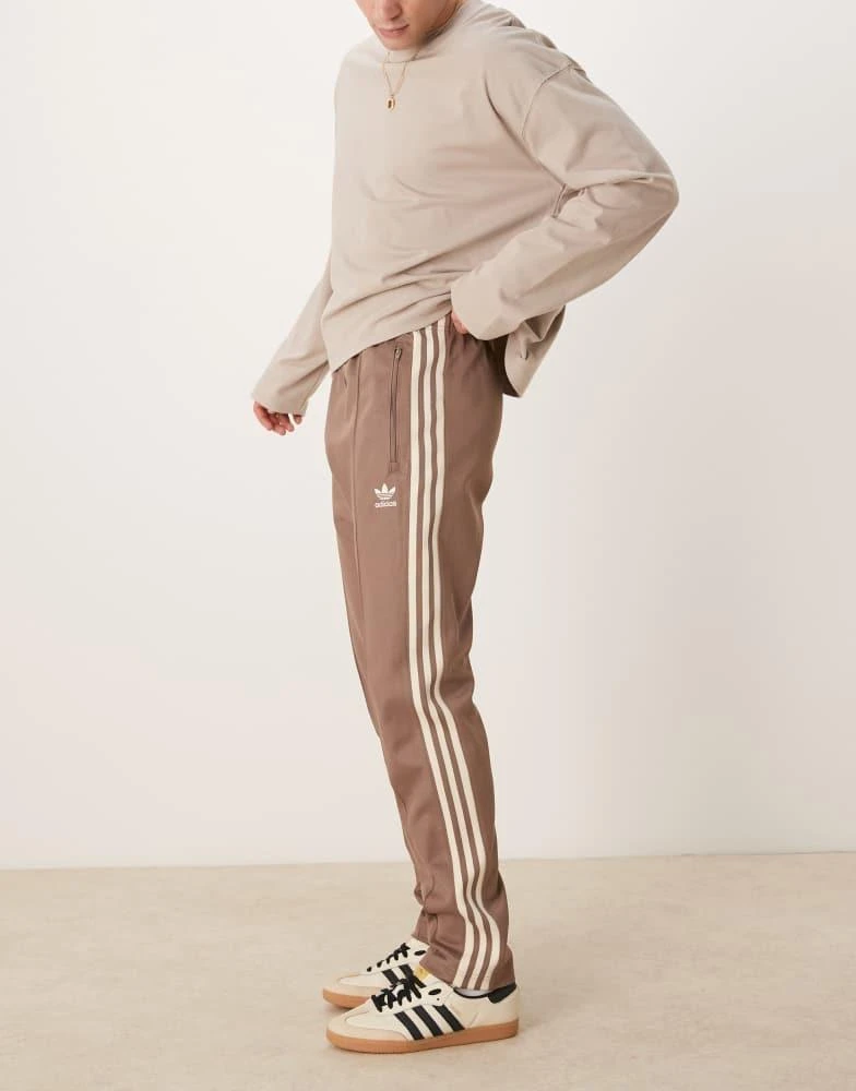 Adidas adidas Originals Classics track pants in brown 1