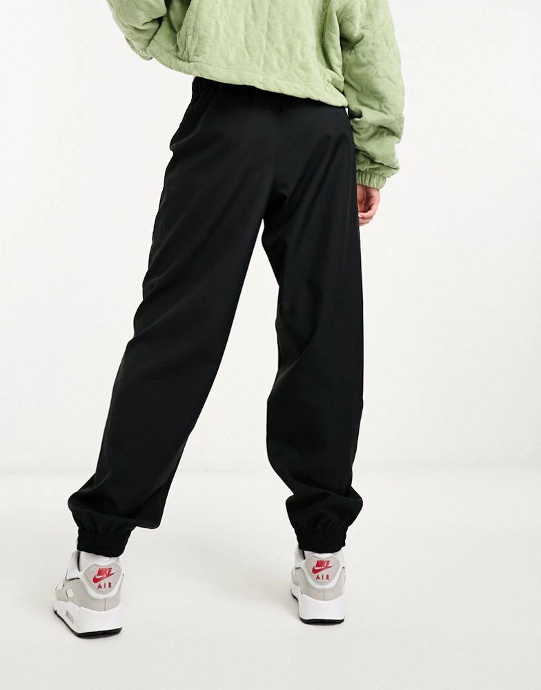 Jordan Jordan core woven track joggers in black 3
