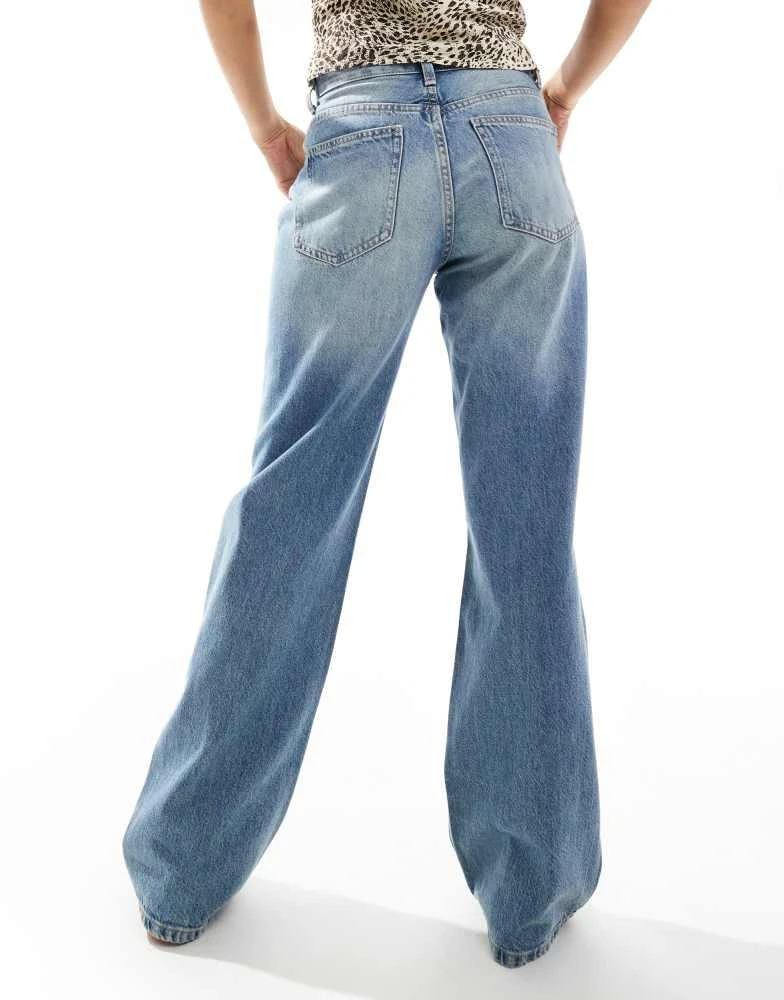 Bershka Bershka ripped knee wide leg jeans in mid wash 2