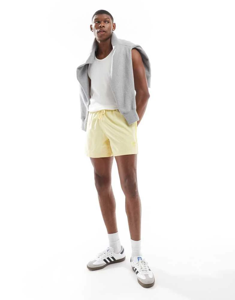 Adidas adidas Originals Adicolor 3-Stripes 5-Inch Swim Shorts in yellow 2