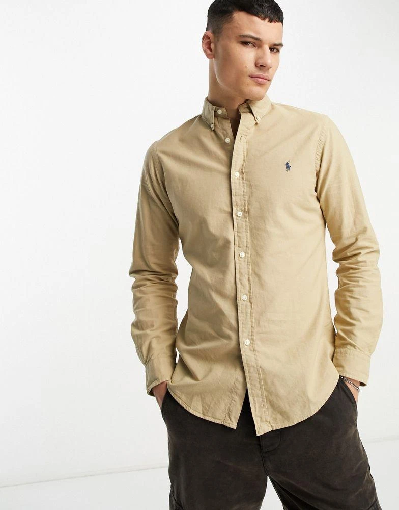Ralph Lauren Polo Ralph Lauren icon logo slim fit garment dyed oxford shirt in tan 1