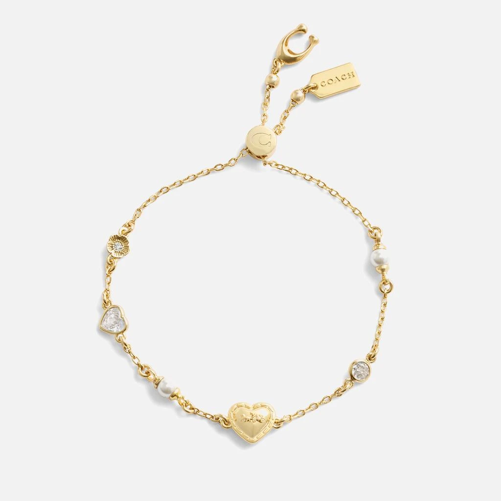 Coach Coach Pearl Heart H&C Gold-Tone Slider Bracelet 1