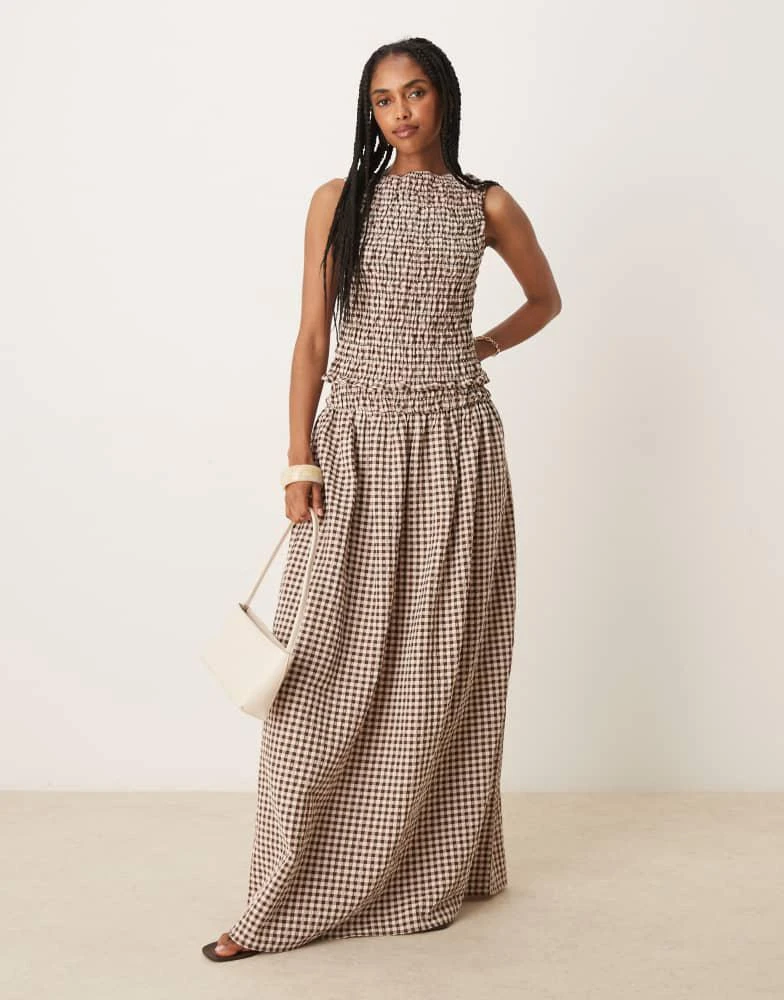 Shop ASOS DESIGN shirred waist maxi skirt in brown gingham on Sale