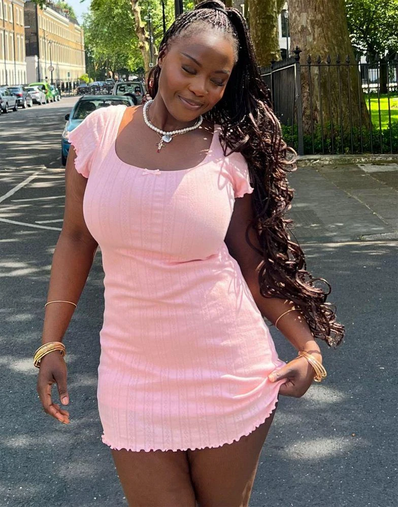 Labelrail Labelrail x Sumbo Owoyele scoop neck bow detail pointelle mini dress in baby pink 3