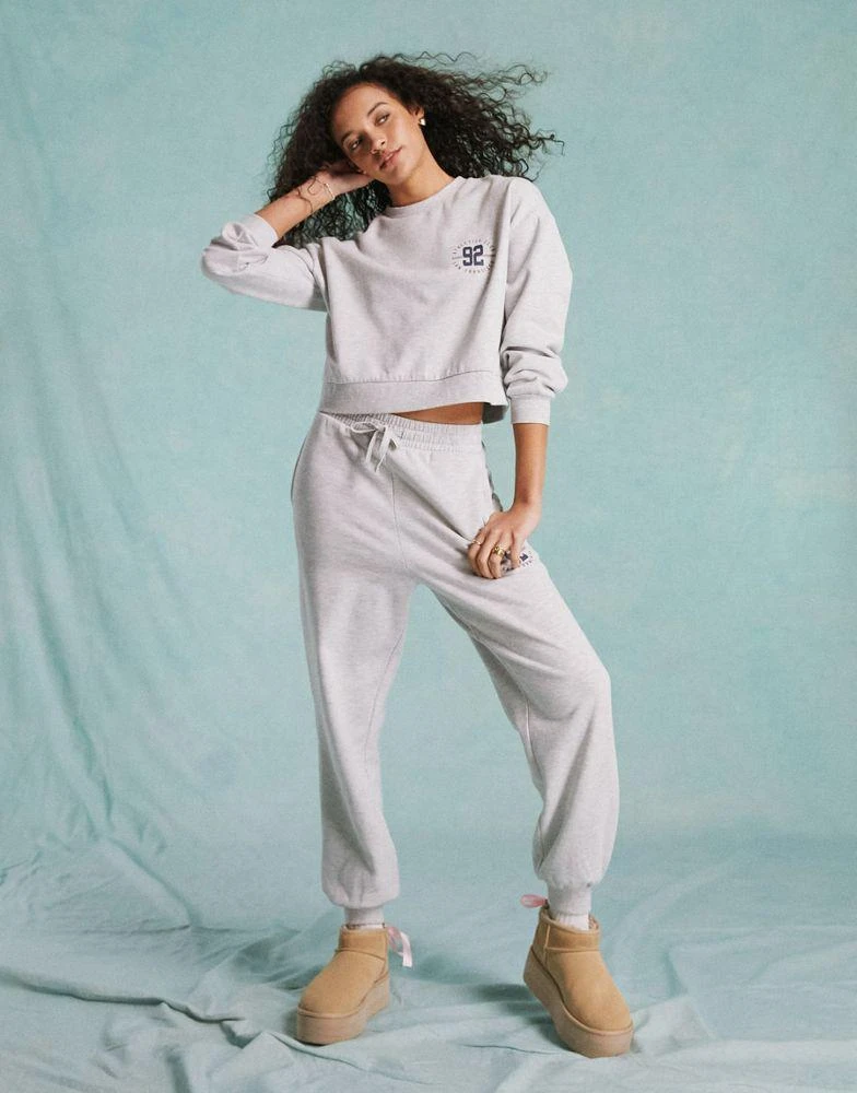 Miss Selfridge Miss Selfridge oversized graphic co-ord jogger in grey marl 1