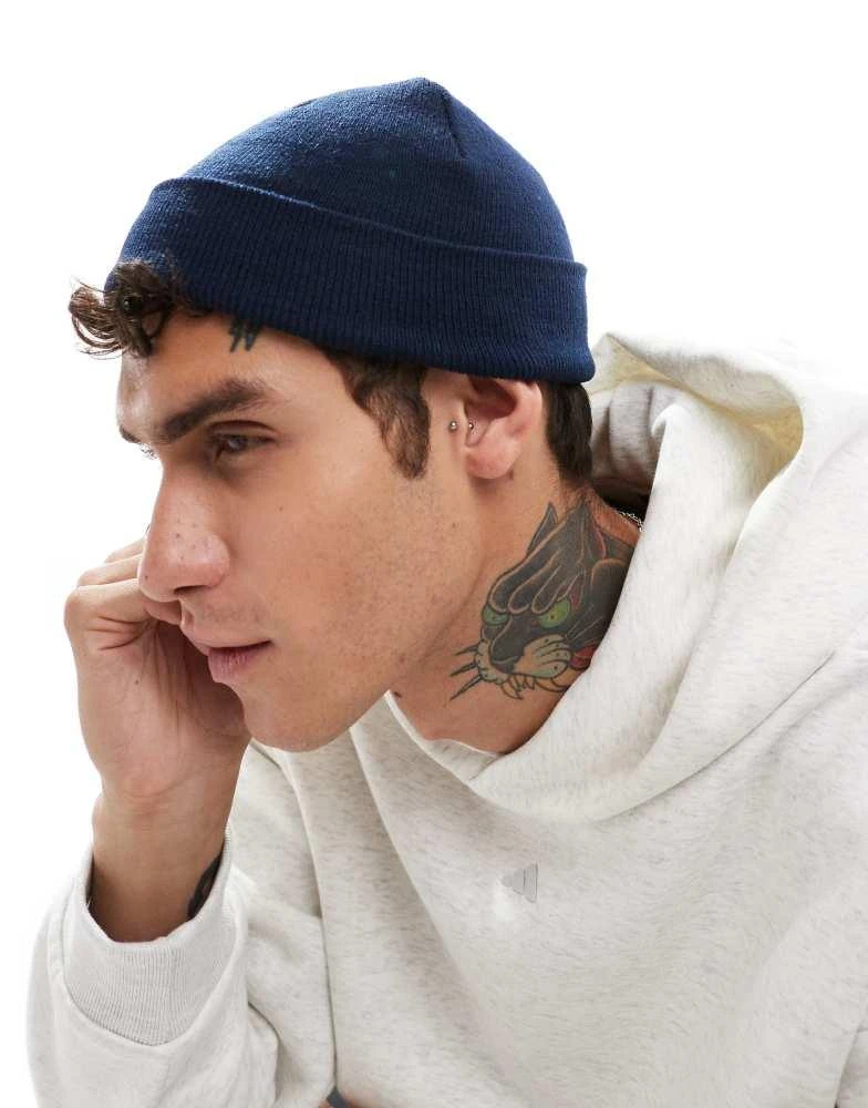 ASOS ASOS DESIGN mini fisherman ribbed beanie in navy 1