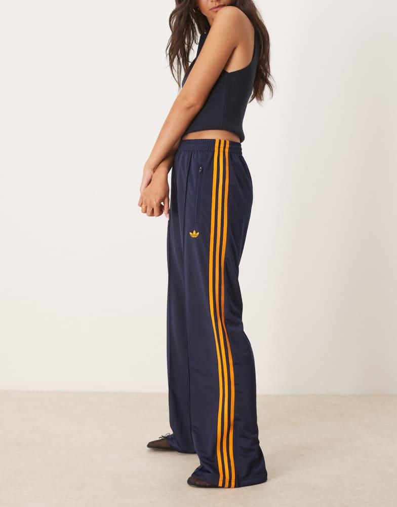 Adidas adidas Originals Firebird Loose track pants in navy and