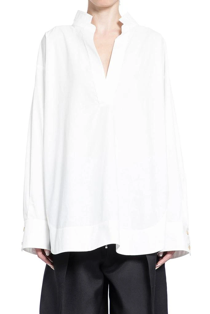 Khaite Khaite The Tito Curved Hem Top 1