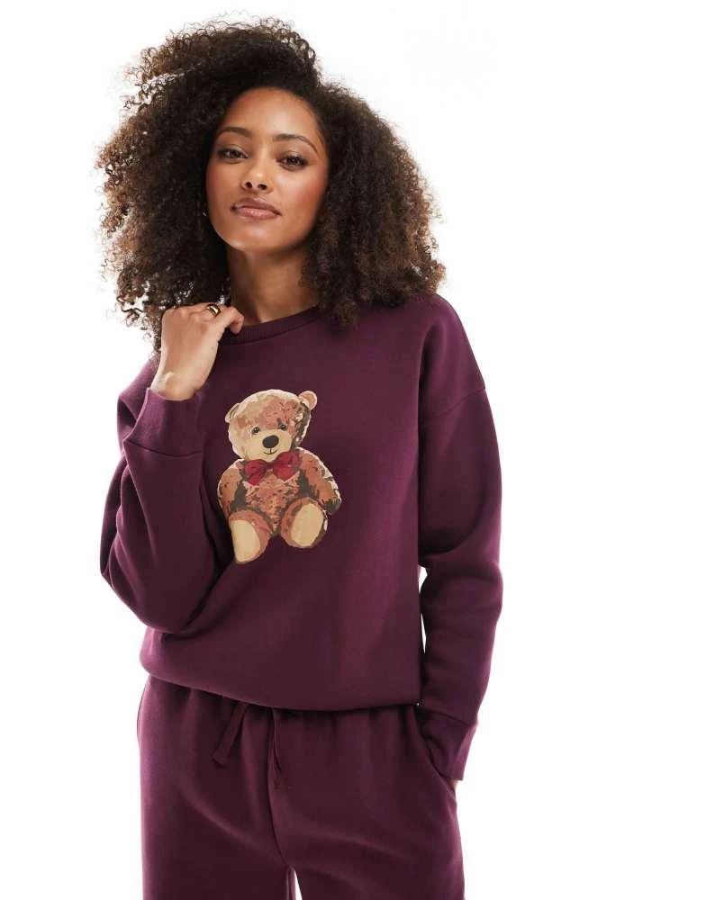 Miss Selfridge Miss Selfridge graphic print teddy sweatshirt in burgundy 1