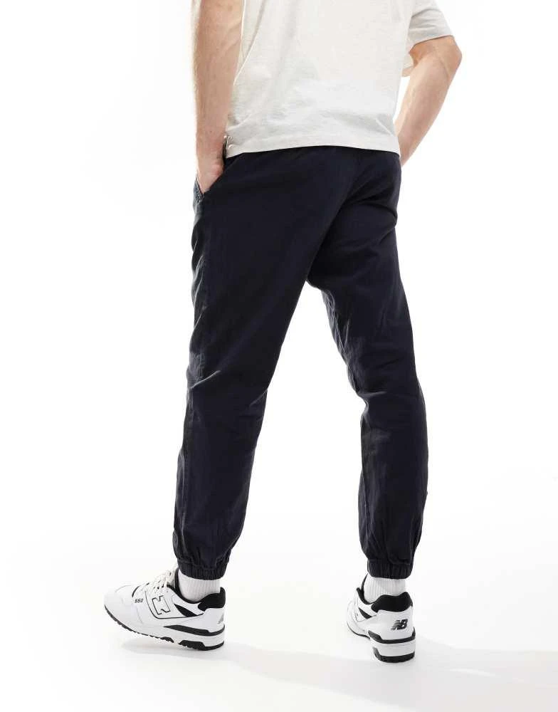 ASOS ASOS DESIGN tapered pull on linen trouser in washed navy 4
