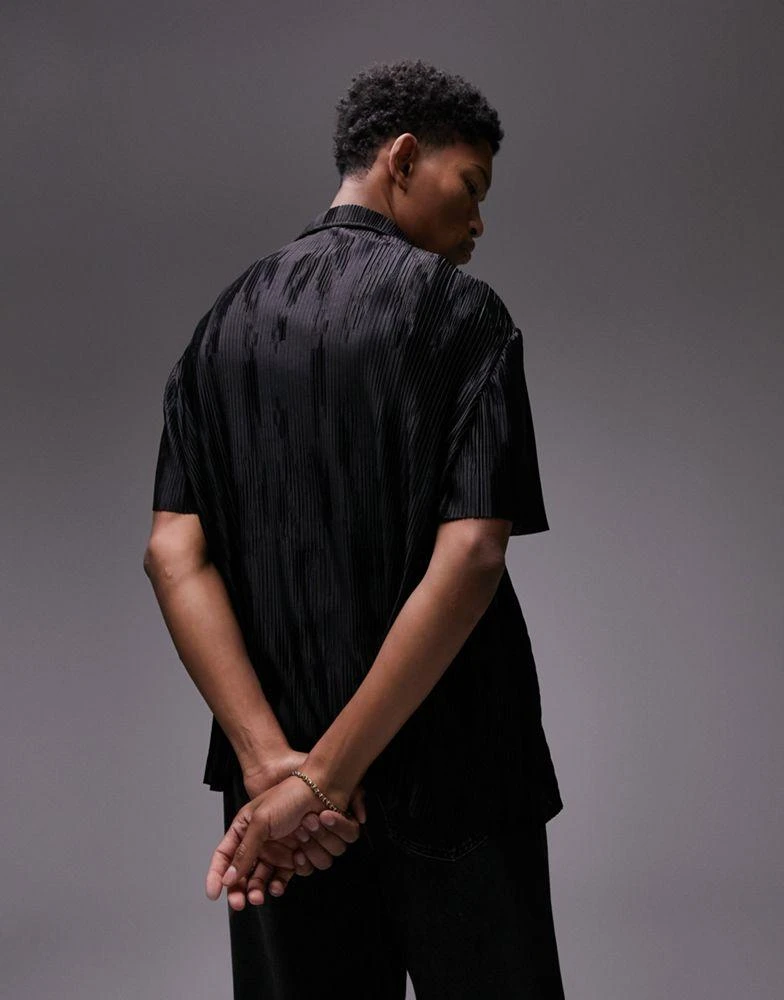 Topman Topman oversized fit button through polo with jacquard plisse in black 3