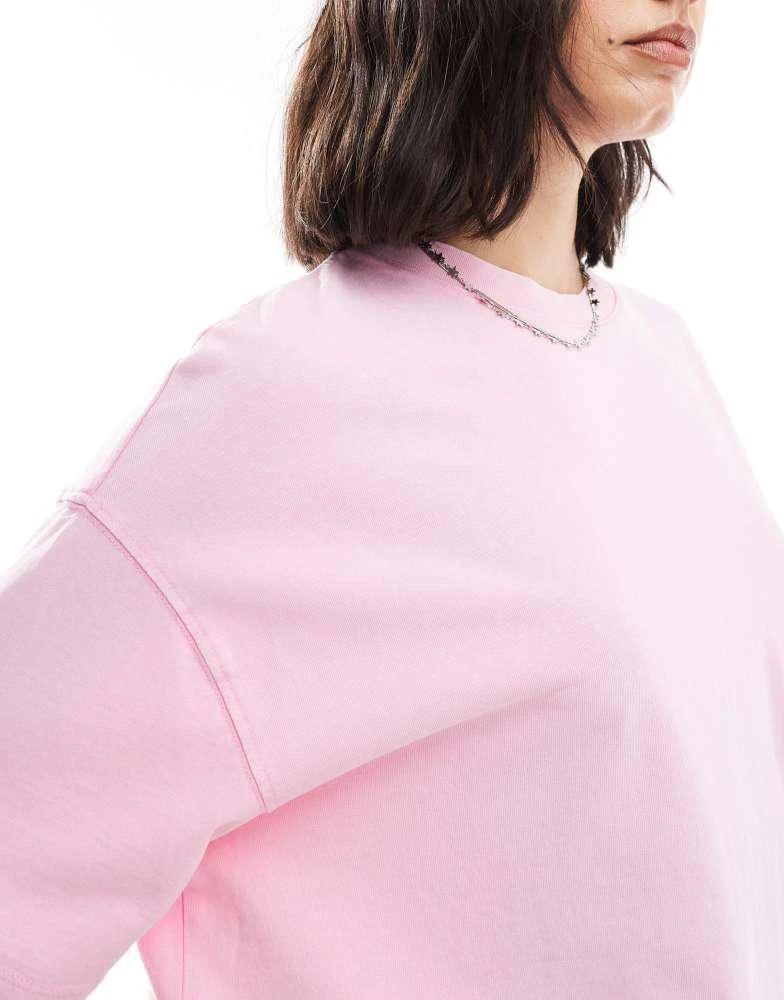 Bershka Bershka heavy cotton boxy fit short sleeve t-shirt in pink 3