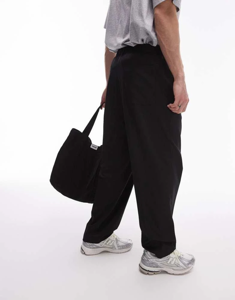 Topman Topman baggy leg with elasticated tie waist jogger in black 4