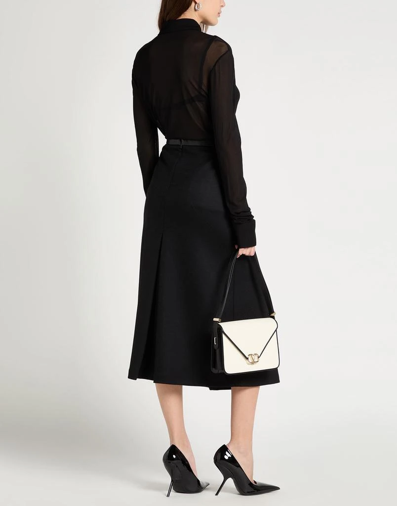 Yves Saint Laurent Solid color shirts 
blouses 3