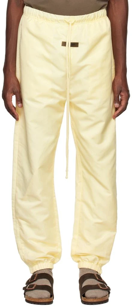 Fear of God ESSENTIALS Yellow Nylon Lounge Pants 1