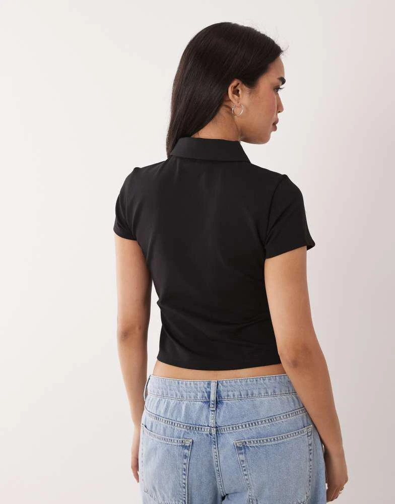 Calvin Klein Calvin Klein Jeans slim fit zip through polo top in black 4