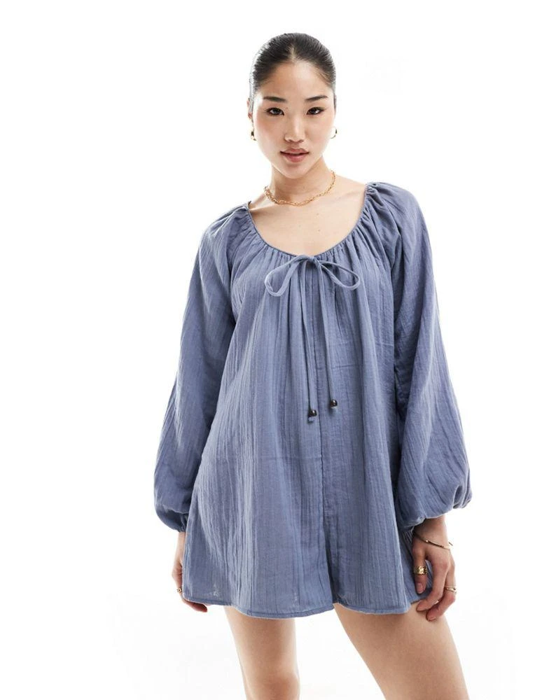 ASOS ASOS DESIGN long sleeve romper playsuit with bead detailing in blue 1