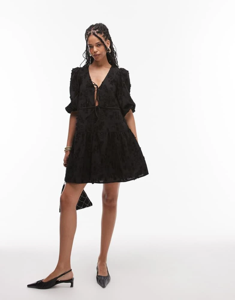 & Other Stories & Other Stories embroidered mini dress with front tie detail and tiered hem in black 2