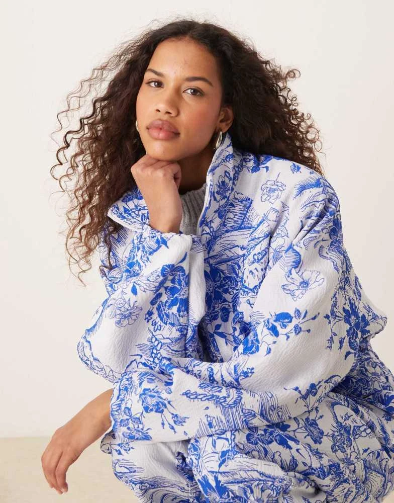 NIKE Nike MDC jaquard floral jacket in blue and white 1
