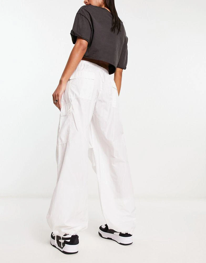 Bershka Bershka tie waist nylon cargo parachute trousers in white 3