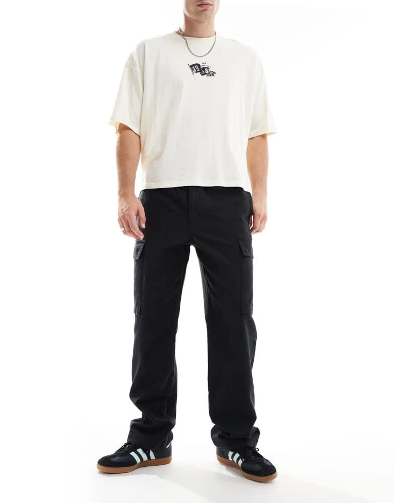 Deus Deus Ex Machina legion surf pants in black 2
