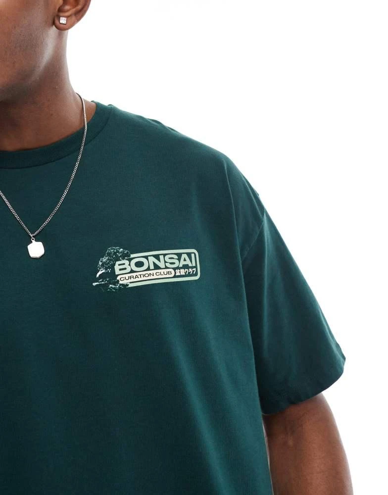 ASOS ASOS DESIGN boxy oversized t-shirt with bonsai graphic in dark green 2