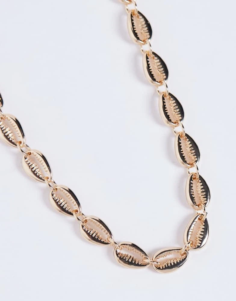 ASOS ASOS DESIGN choker necklace with faux shell design in gold 2