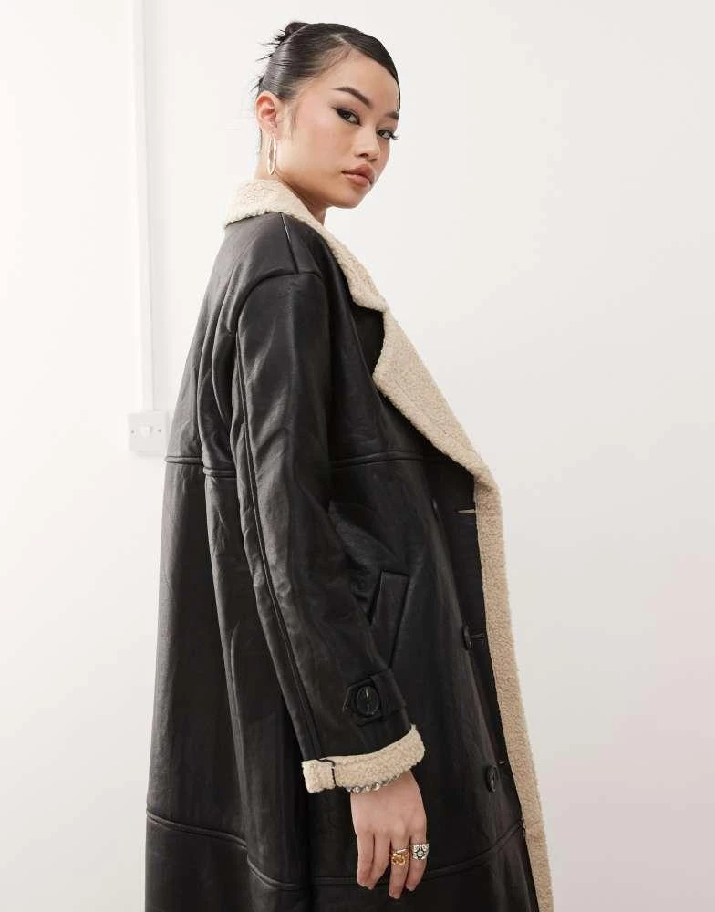 Princess Polly Princess Polly leather look contrast faux shearling button front longline coat in black and beige 2