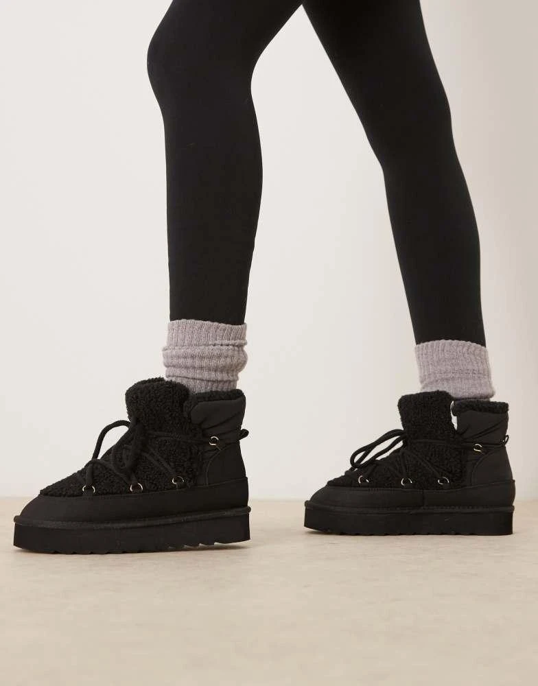New Look New Look suedette snow boot in black 2
