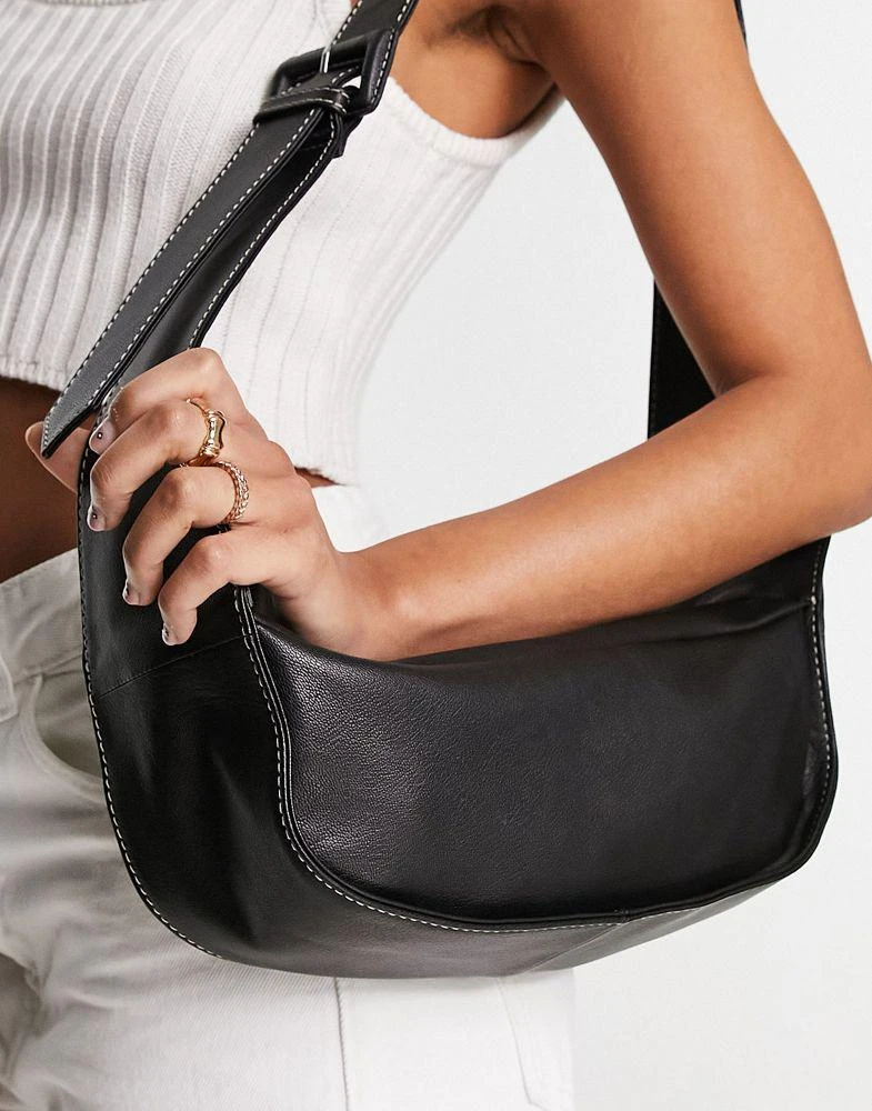 ASOS ASOS DESIGN leather curved base crossbody sling bag with contrast stitch in black 4