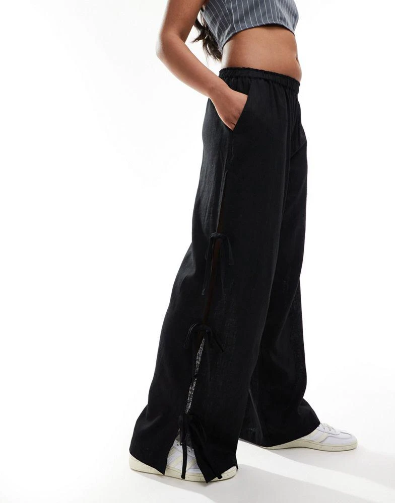 ASOS ASOS DESIGN pull on trouser with tie side with linen in black 4