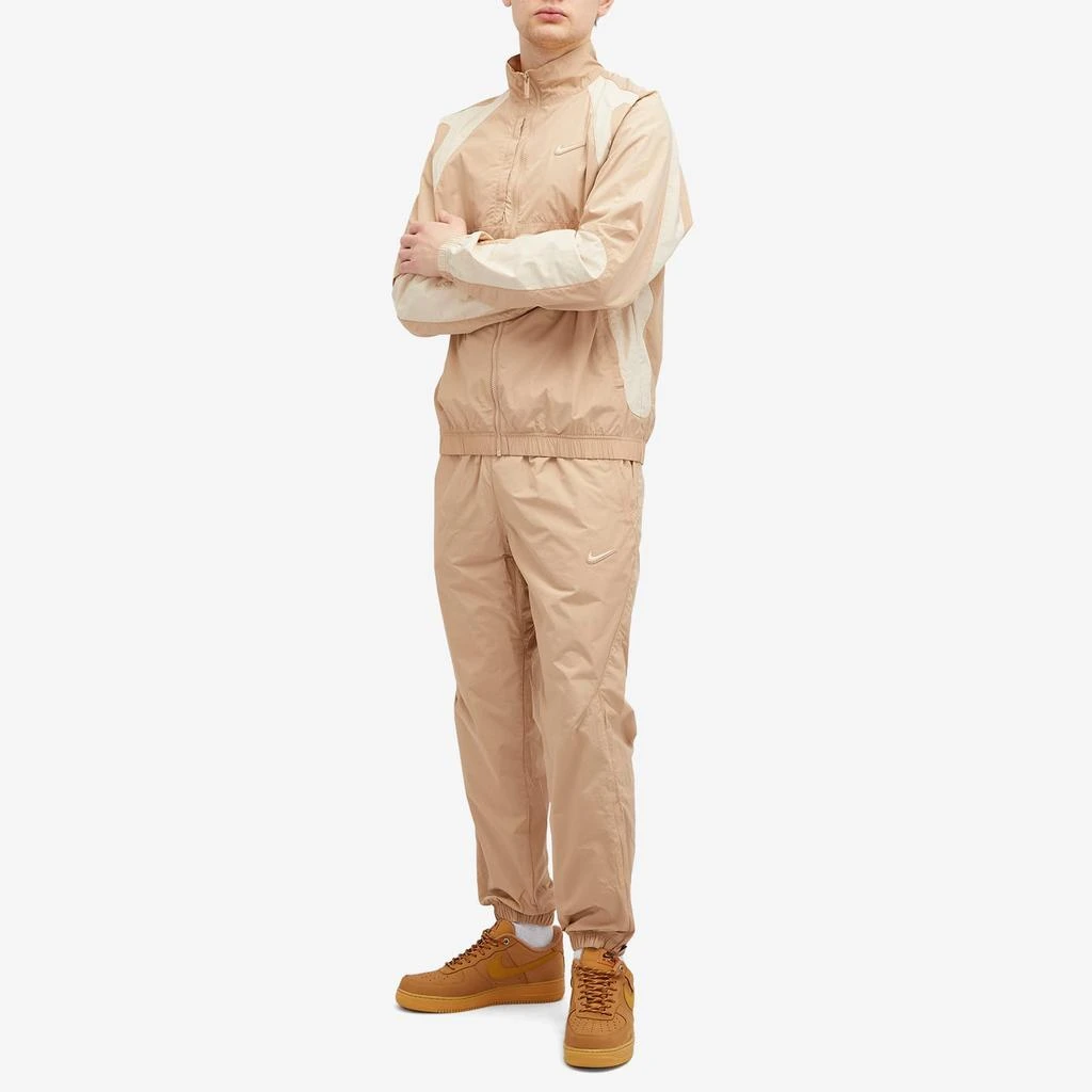 NIKE Nike x NOCTA Cardinal Stock Woven Track Pants 5