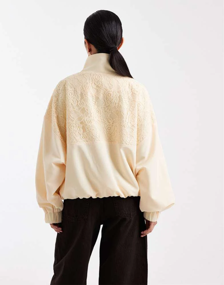 Miss Selfridge Miss Selfridge lace insert funnel neck track jacket in buttermilk 3