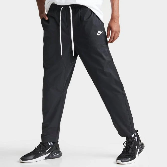 NIKE Men's Nike Club Woven Tapered Pants 1