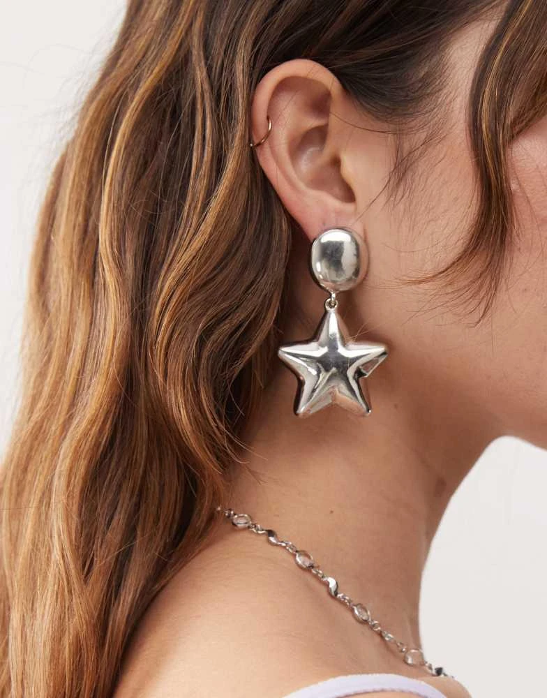Reclaimed Vintage Reclaimed Vintage star drop earrings in silver 1