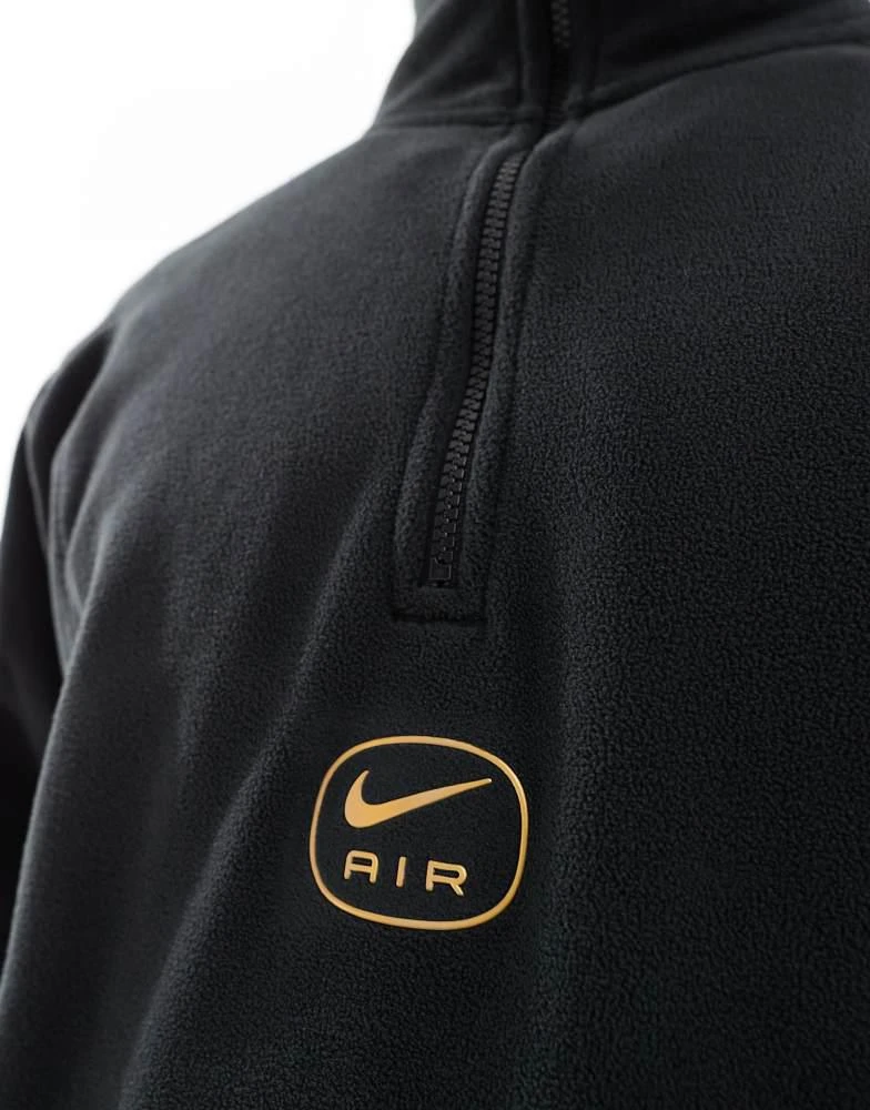 NIKE Nike Swoosh Air polar fleece half zip sweatshirt in black and gold 4