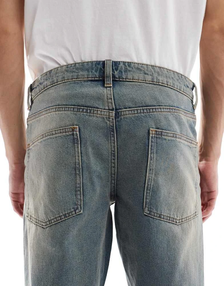 ASOS ASOS DESIGN tapered jeans with tint in light wash blue 5