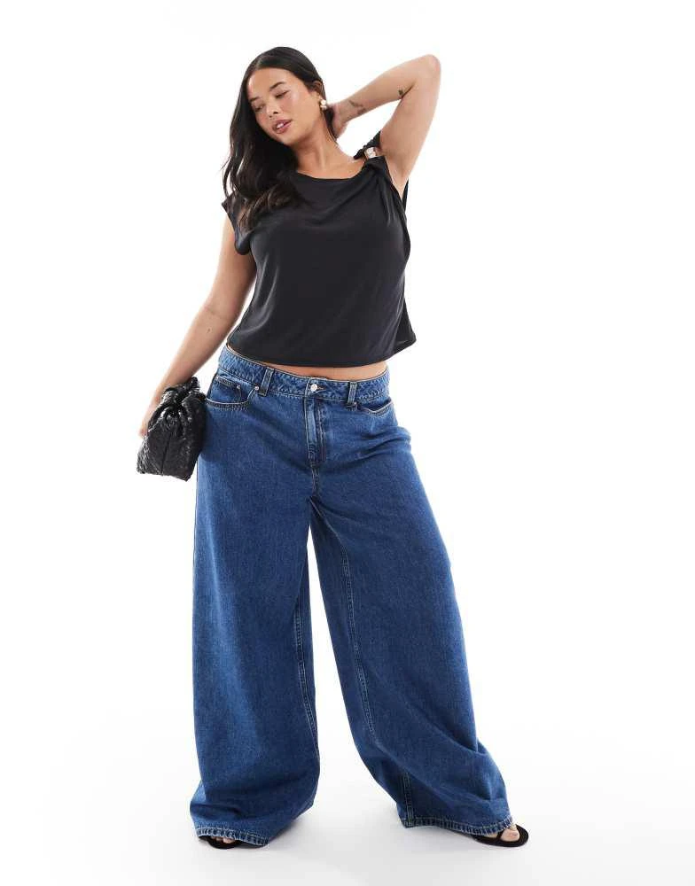 ASOS ASOS DESIGN Curve high waist wide leg jeans in midwash blue 1