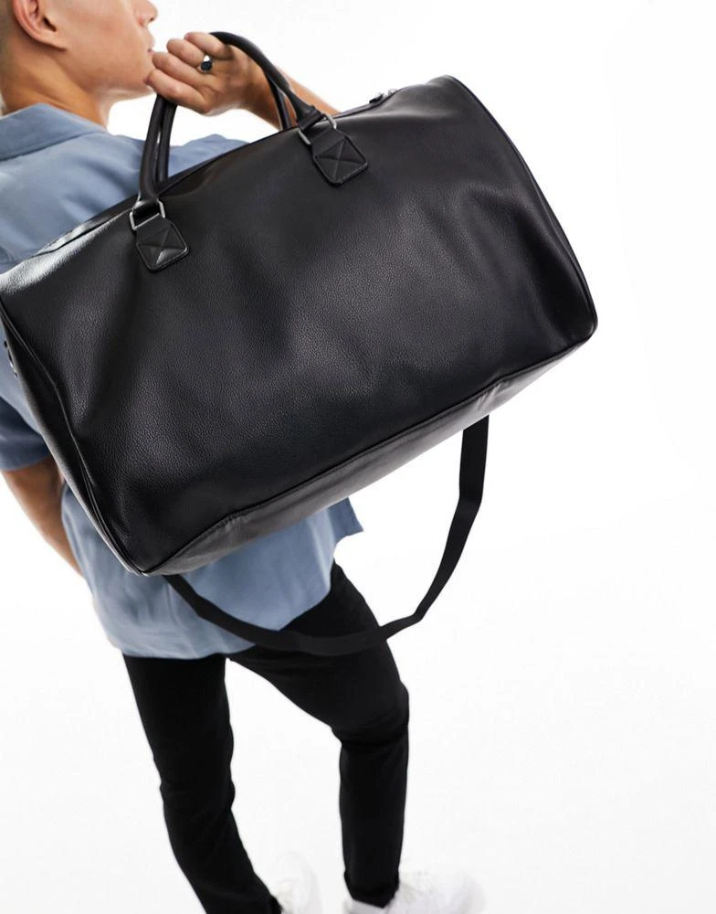 ASOS ASOS DESIGN smart faux leather weekend holdall bag in black 3