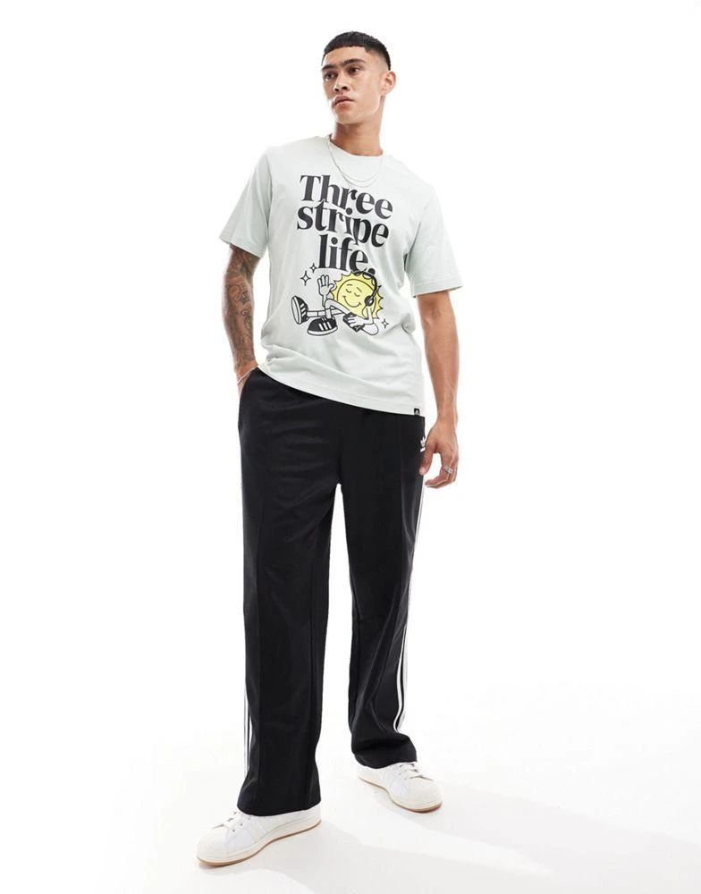 Adidas adidas Training t-shirt with three stripe life graphic in green 3
