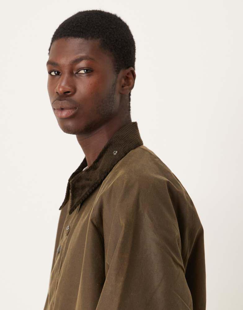 Shop Barbour Transport oversized wax jacket in beech on Sale at