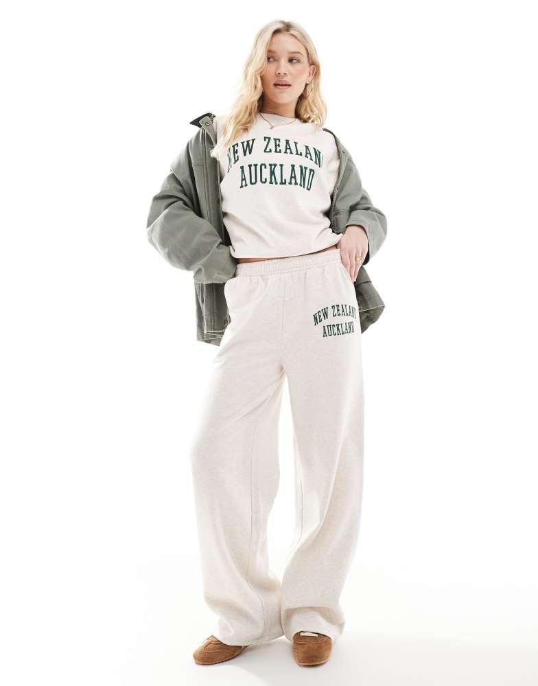 Sporty & Rich Varsity Crest Sweat Pants – On Sale Now with