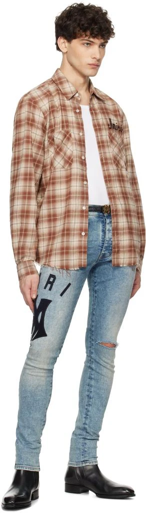 AMIRI Blue Suede Applique Logo Skinny Jeans 4