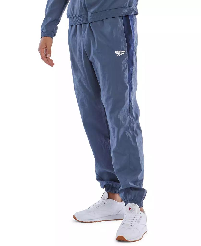 Reebok blue track pants online