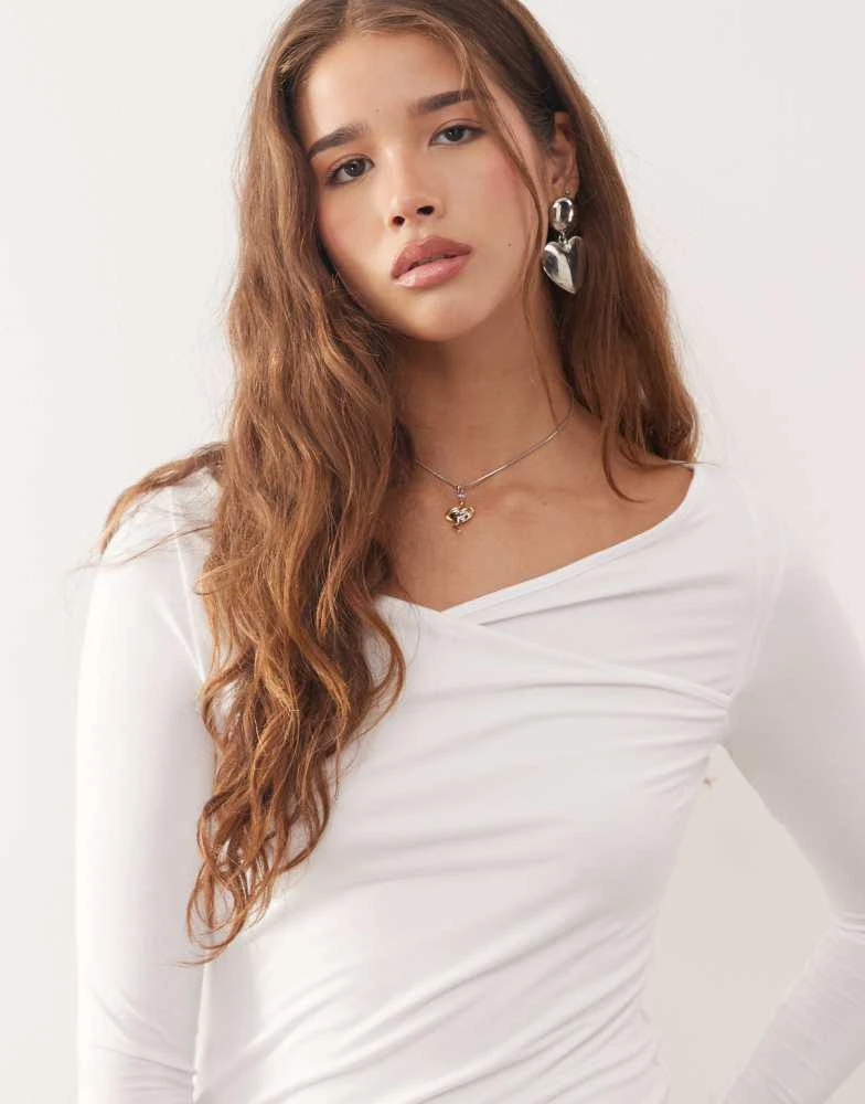 Weekday Weekday slim fit long sleeve wrap top in white 3