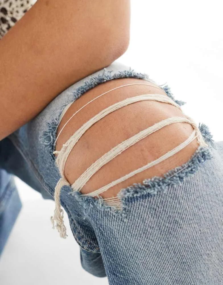 Bershka Bershka ripped knee wide leg jeans in mid wash 5