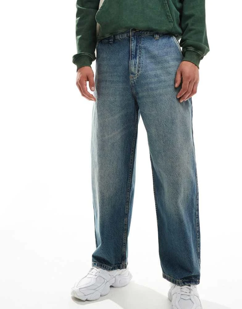 Pull&Bear Pull&Bear skater fit jean in blue with yellow cast 1