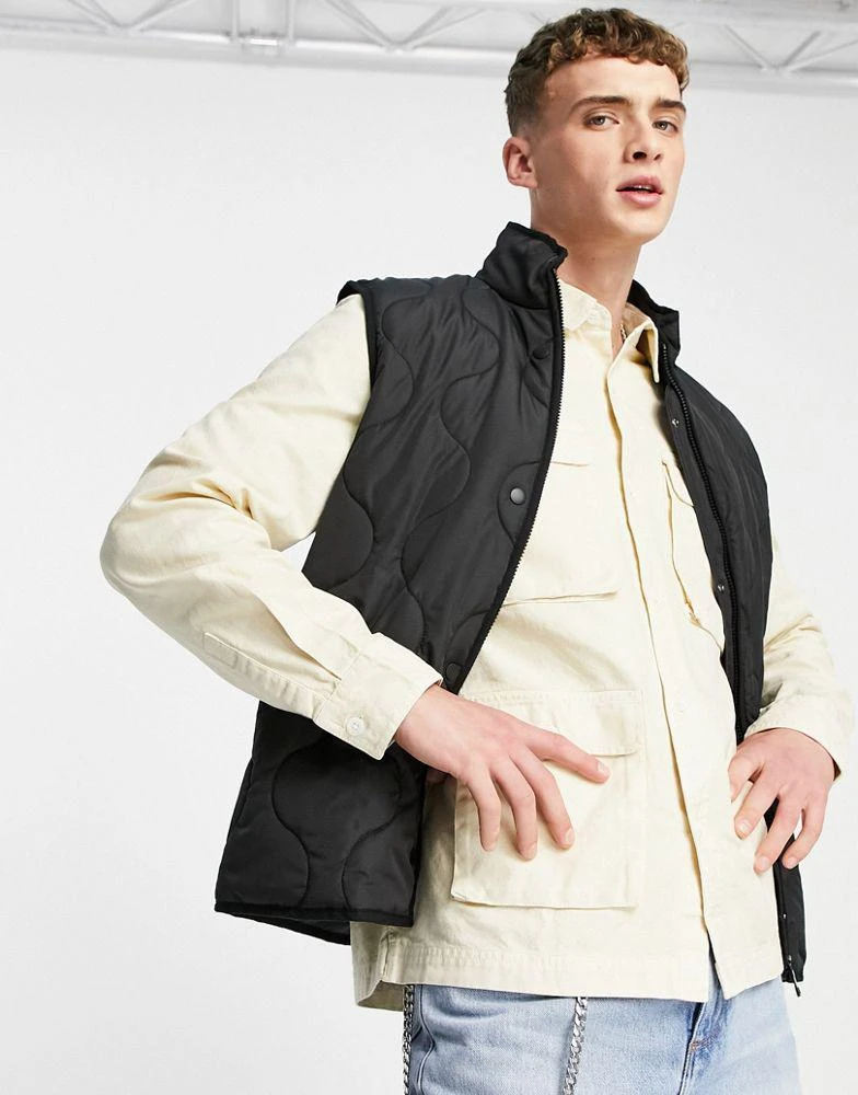 ASOS ASOS DESIGN quilted gilet in black 3