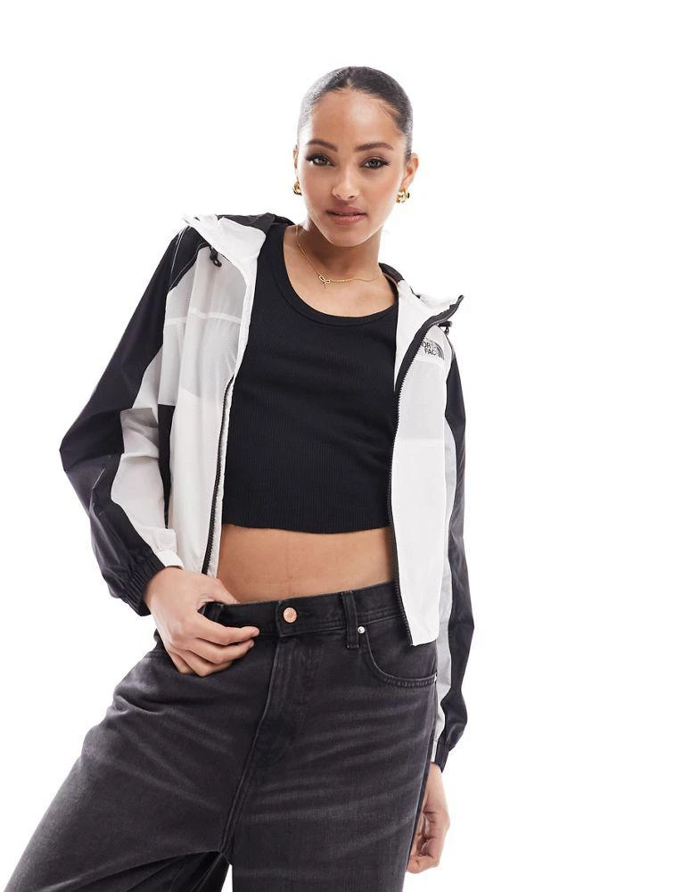 The North Face The North Face Himalia packable waterproof wind jacket in off white Exclusive at ASOS 1